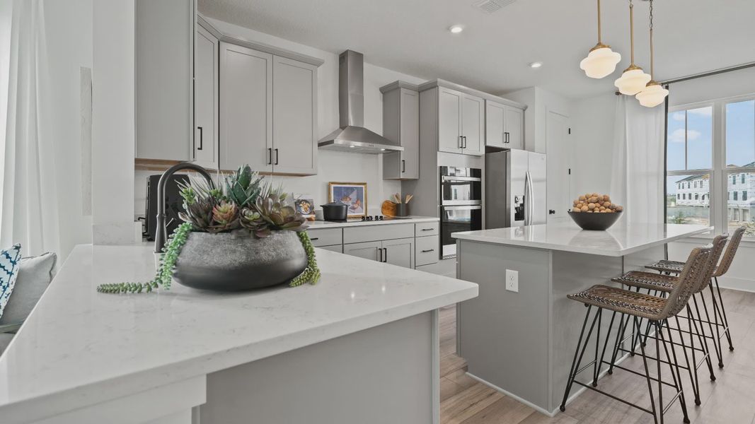 Furnished interior view inside a new home in Parkview at Hamlin, Winter Garden (Image 24).
