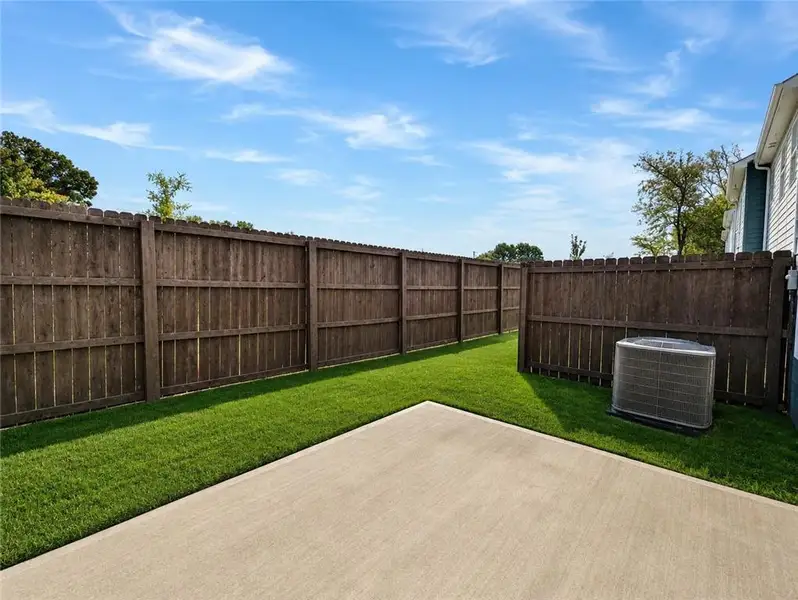 Exterior details and patio area of a home in Walden Park – The Collection, Jonesboro (Image 3).