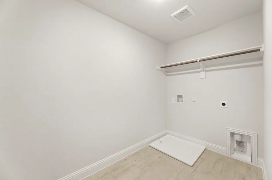 Front exterior of a new home in Sereno Oaks at Buckner Terrace, Dallas, TX, highlighting curb appeal (Image 11).