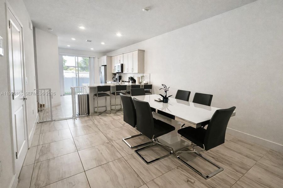 Elegant dining space ideal for hosting family and guests Elegant dining space ideal for hosting family and guests