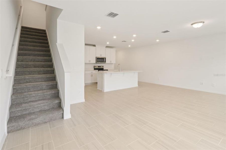 Furnished interior view inside a new home in The Meadow at Crossprairie Townes, St. Cloud (Image 6).