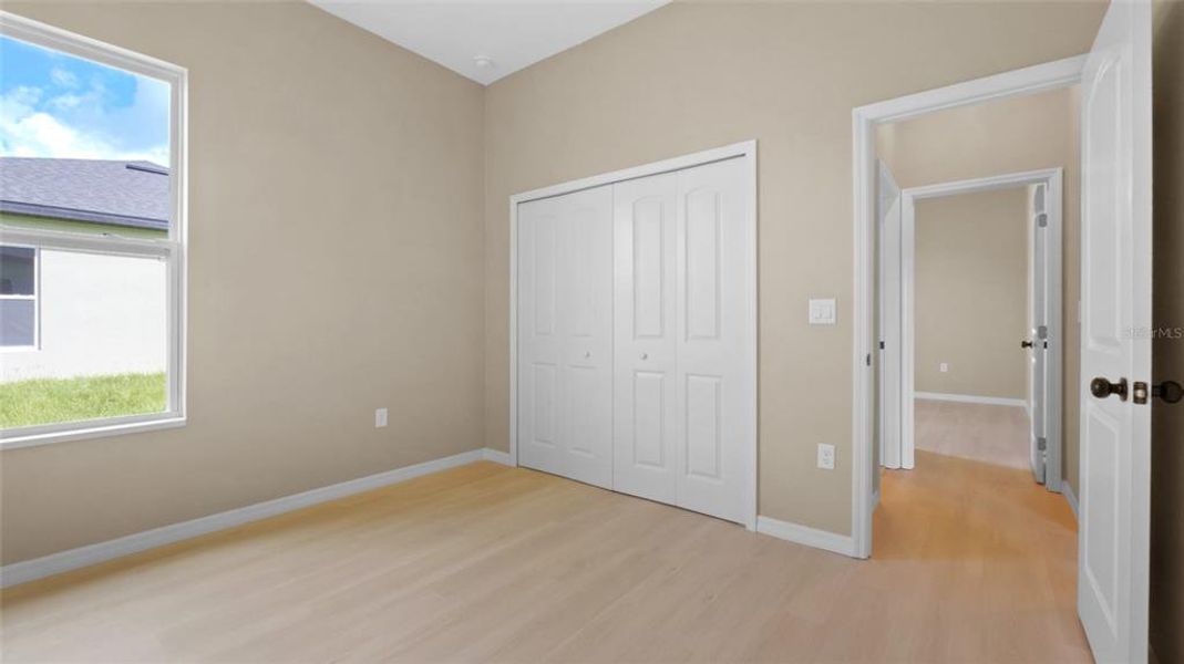 Spacious, unfurnished interior of a new home in , Port Charlotte (Image 26).