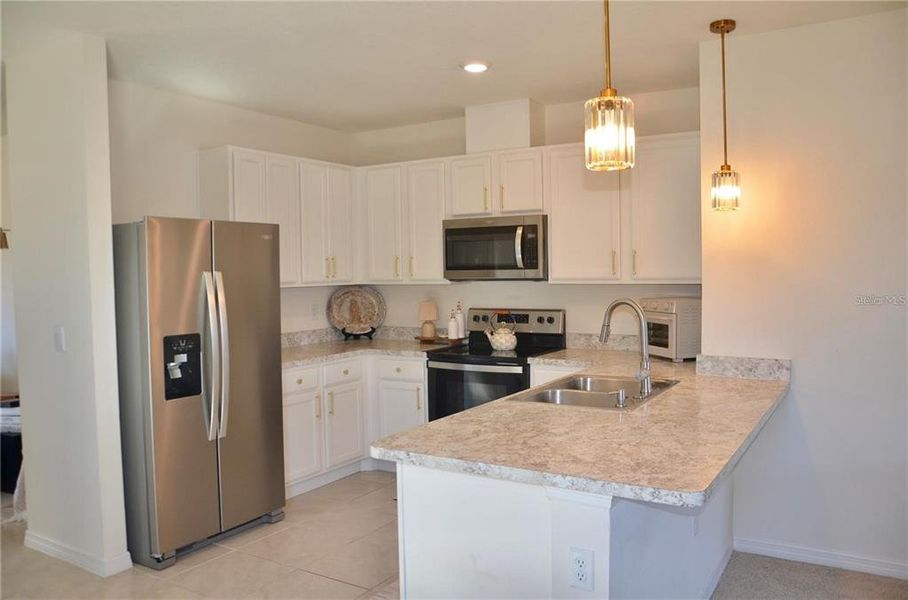 Furnished interior view inside a new home in , Davenport (Image 15).