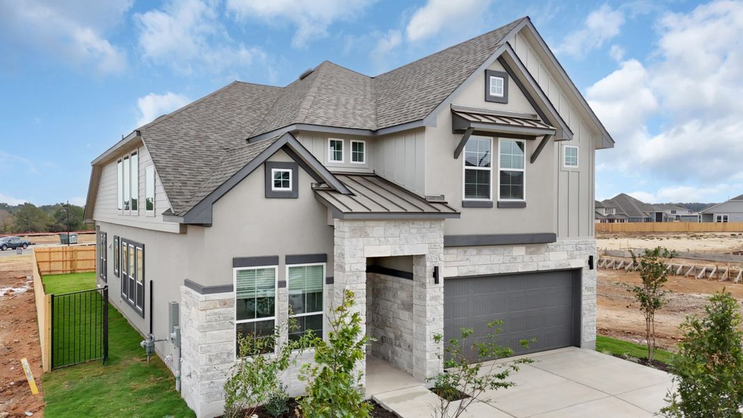 Front exterior of a new home in Highland Village, Georgetown, TX, highlighting curb appeal (Image 28). Front exterior of a new home in Highland Village, Georgetown, TX, highlighting curb appeal (Image 28).