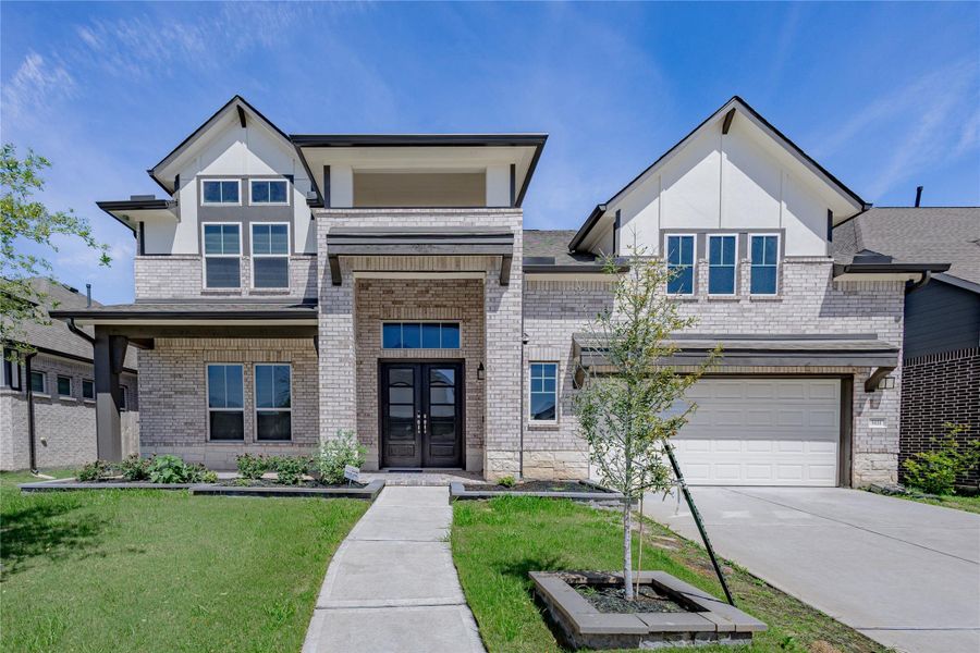 Front exterior of a new home in , Richmond, TX, highlighting curb appeal (Image 22).