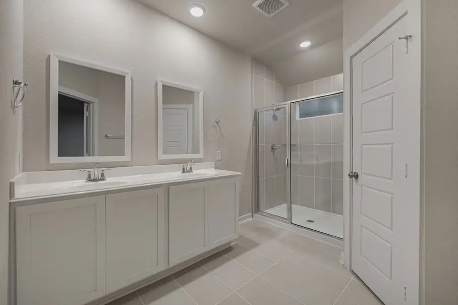 Representative furnished interior of a home built from the Gunther by Chesmar Homes in Briarwood, Cypress (Image 4).
