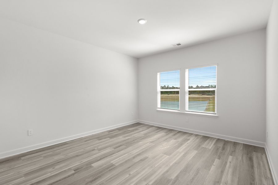 Spacious, unfurnished interior of a new home in Waterside - Boardwalk Series, Longs (Image 12).