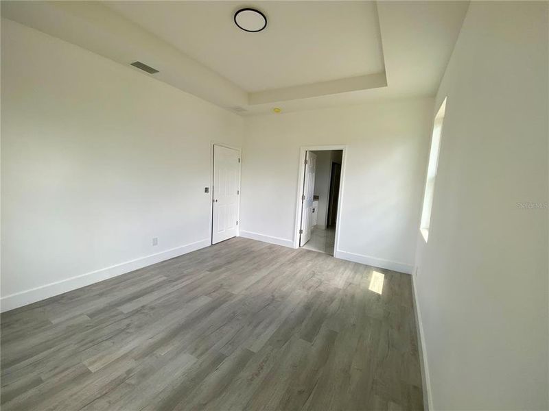 master bedroom wood laminate flooring