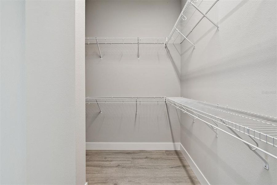 Spacious, unfurnished interior of a new home in Emerald Landing at Waterside at Lakewood Ranch – Cottage Series, Sarasota (Image 24). Spacious, unfurnished interior of a new home in Emerald Landing at Waterside at Lakewood Ranch – Cottage Series, Sarasota (Image 24).