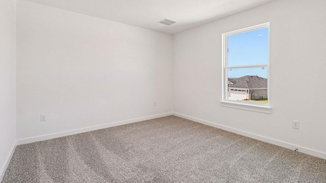 Spacious, unfurnished interior of a new home in Monarch Ranch, Manor (Image 21).