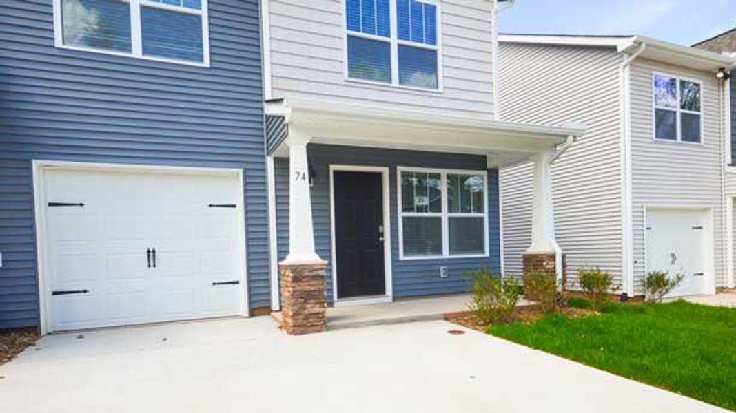 Exterior details and patio area of a home in Aberdeen Place, Asheville (Image 1).