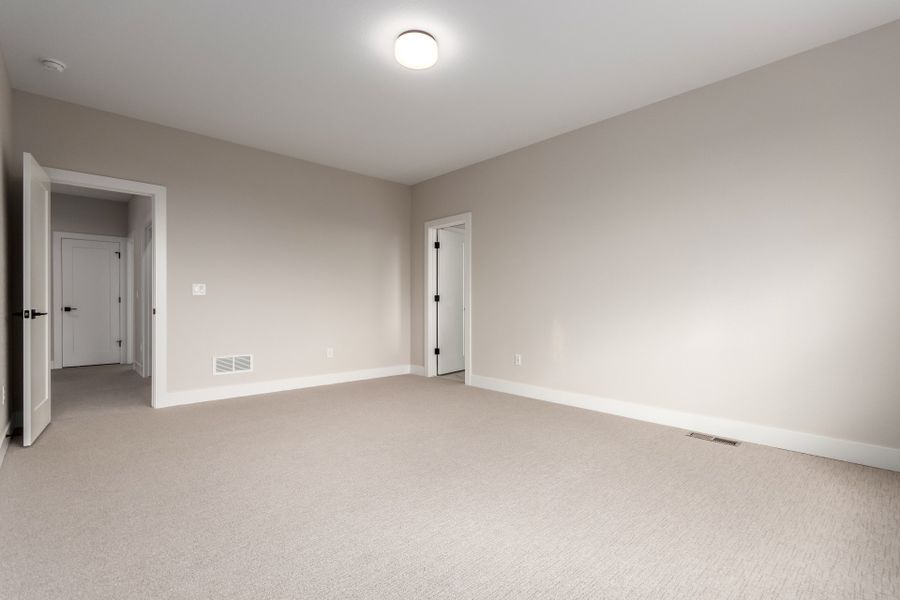 Spacious, unfurnished interior of a new home in West Grange, Longmont (Image 38).