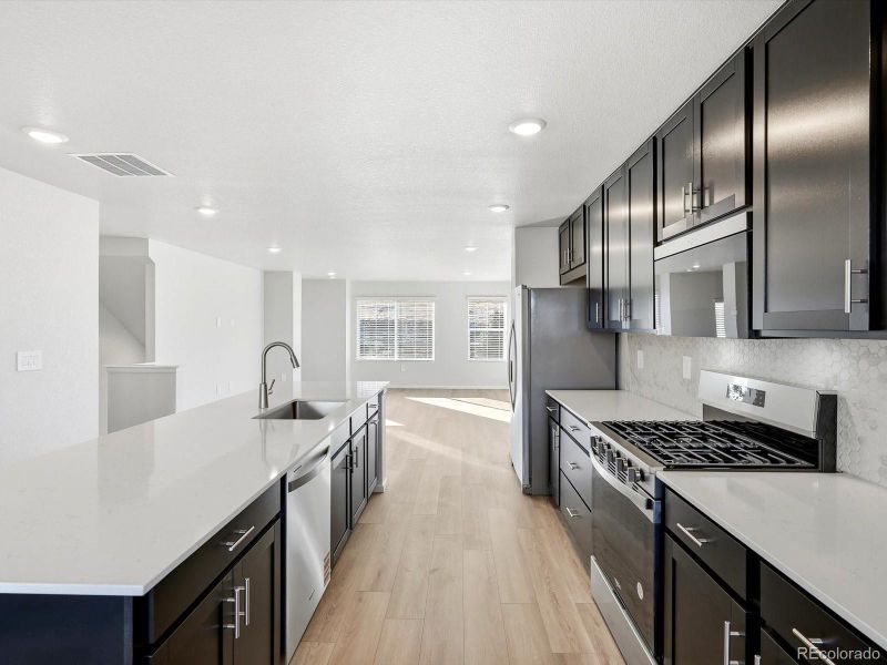 Furnished interior view inside a new home in Three Hills, Morrison (Image 10).