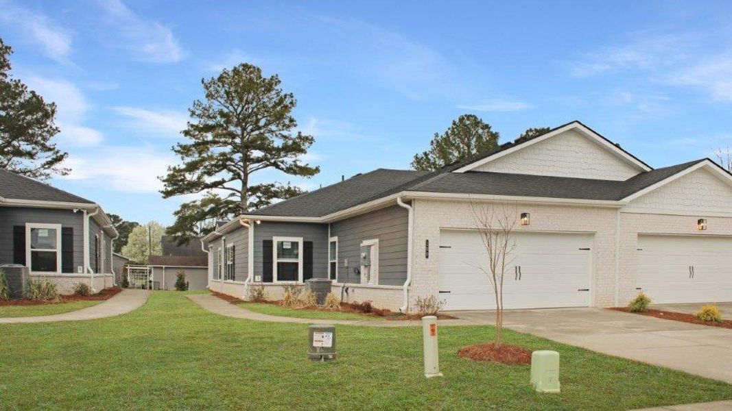 Front exterior of a new home in Cambridge Cove, Chickamauga, GA, highlighting curb appeal (Image 2).