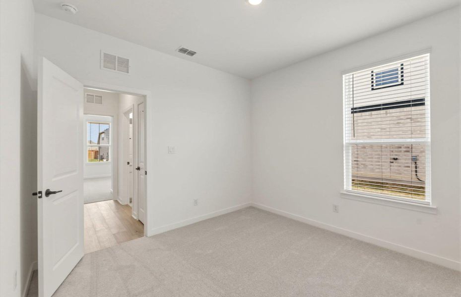 Spacious, unfurnished interior of a new home in Sunfield, Buda (Image 17). Spacious, unfurnished interior of a new home in Sunfield, Buda (Image 17).
