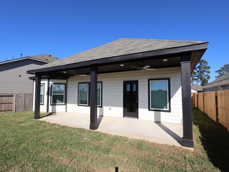 Exterior details and patio area of a home in Moran Ranch, Willis (Image 12).
