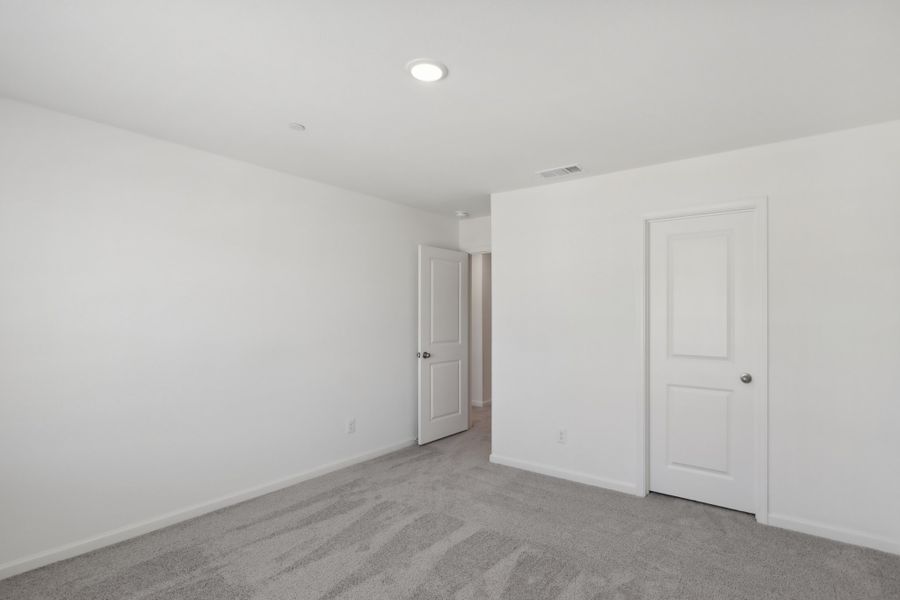 Representative unfurnished interior of a home built from the Orbit by Starlight Homes in Coyote Meadows, Anna (Image 26). Representative unfurnished interior of a home built from the Orbit by Starlight Homes in Coyote Meadows, Anna (Image 26).