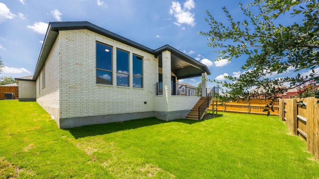 Exterior details and patio area of a home in Parkside on the River, Georgetown (Image 3).