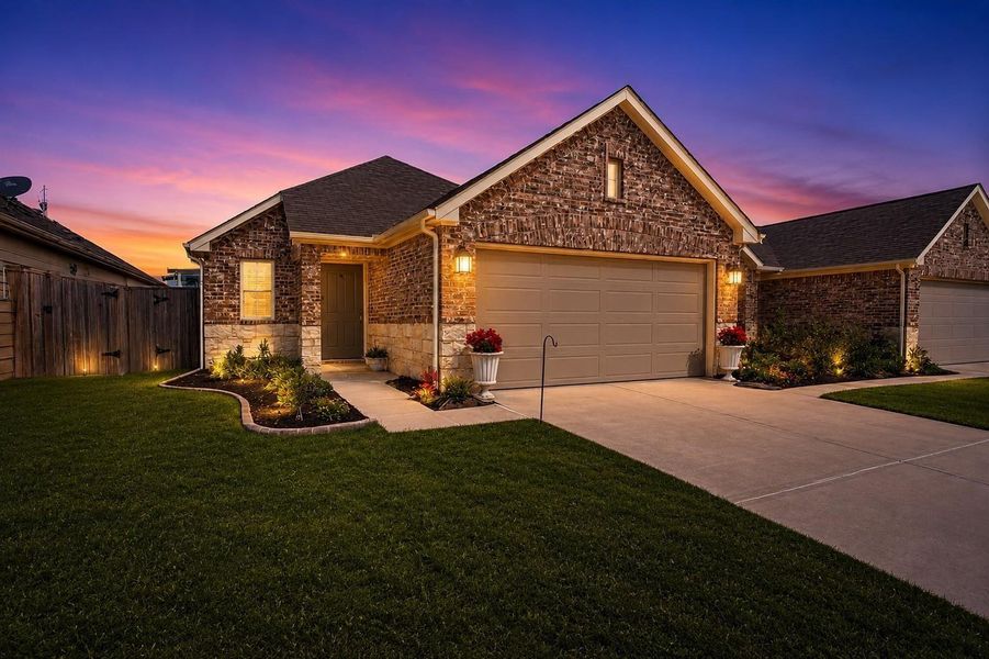 Front exterior of a new home in Moran Ranch, Willis, TX, highlighting curb appeal (Image 19). Front exterior of a new home in Moran Ranch, Willis, TX, highlighting curb appeal (Image 19).