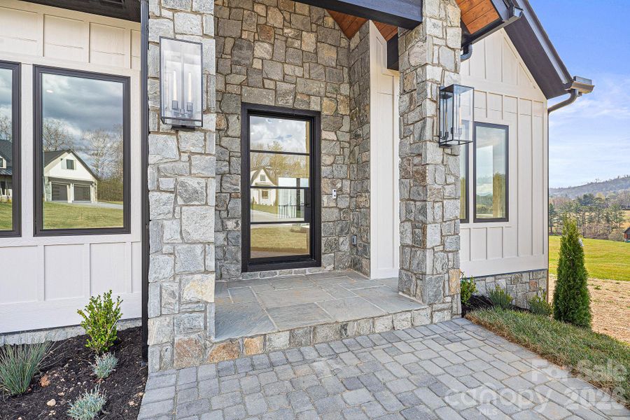 Exterior details and patio area of a home in , Fletcher (Image 29).