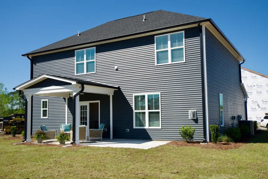 Exterior details and patio area of a home in Parkwood Estates, Leland (Image 2).