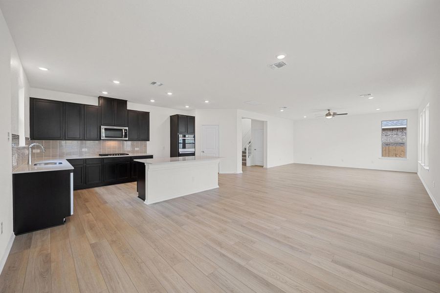 Furnished interior view inside a new home in Salerno - Classic Collection, Round Rock (Image 10). Furnished interior view inside a new home in Salerno - Classic Collection, Round Rock (Image 10).