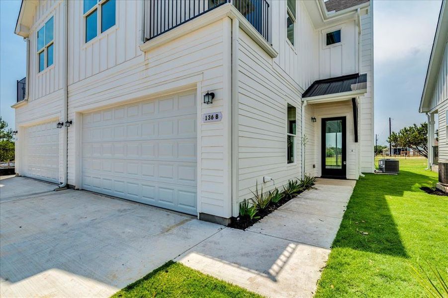 Clean lines and classic white siding create a welcoming curb appeal for this contemporary residence. Clean lines and classic white siding create a welcoming curb appeal for this contemporary residence.