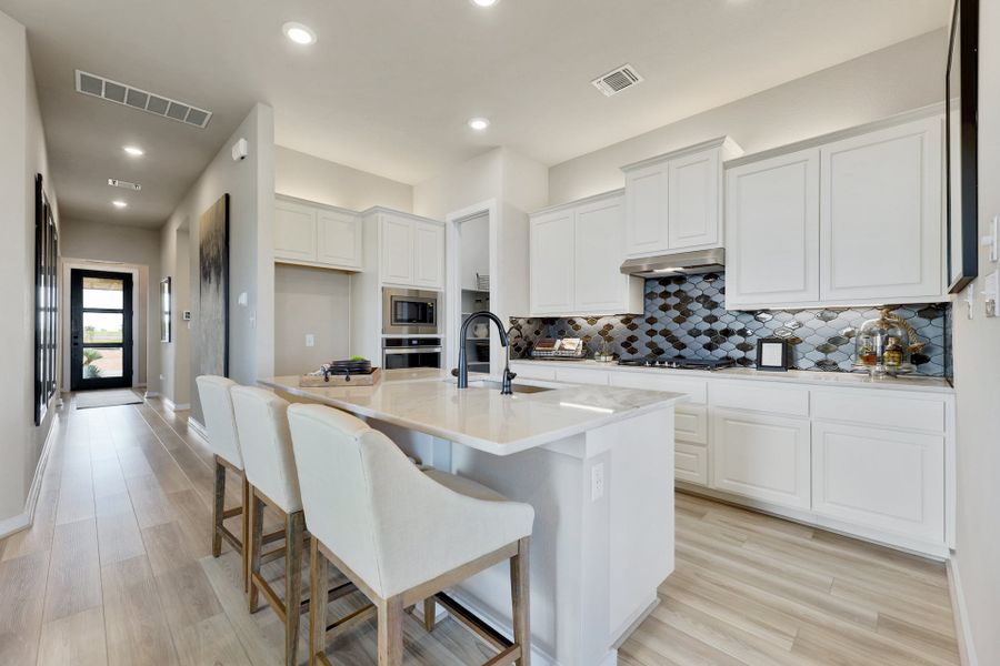 Representative furnished interior of a home built from the Lanport by Scott Felder Homes in Flora, Hutto (Image 8).
