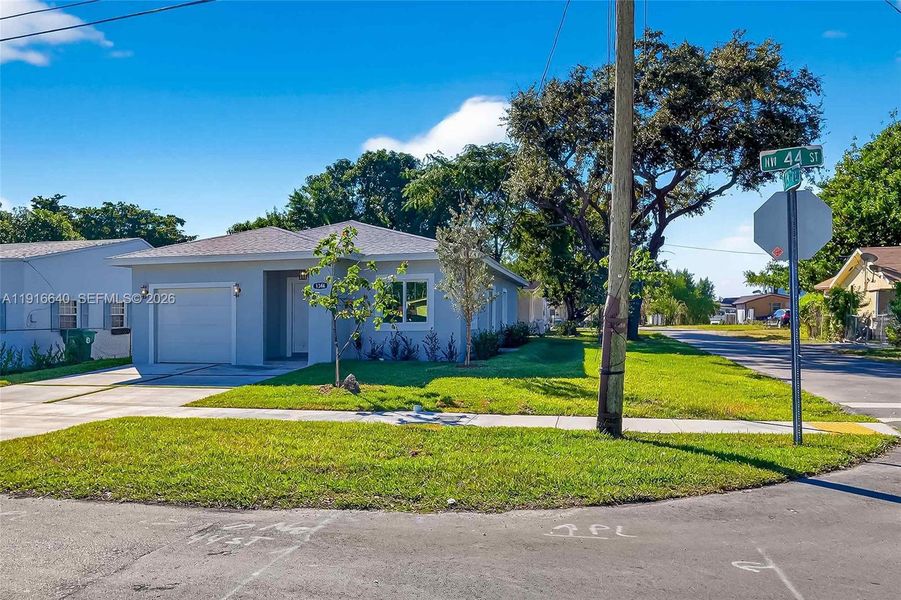 Front exterior of a new home in , Miami, FL, highlighting curb appeal (Image 24).