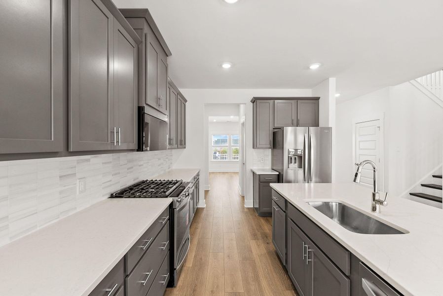 Furnished interior view inside a new home in The Coves at Lakes of Cane Bay, Summerville (Image 37). Furnished interior view inside a new home in The Coves at Lakes of Cane Bay, Summerville (Image 37).
