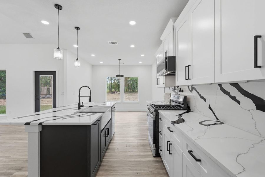 Furnished interior view inside a new home in , Conroe (Image 15).