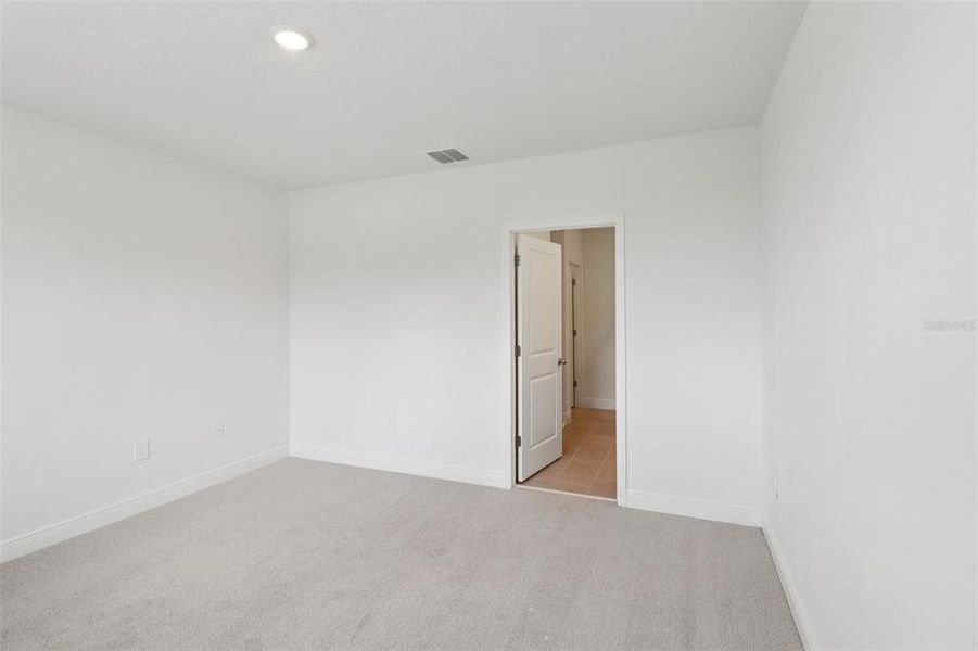 Spacious, unfurnished interior of a new home in The Reserve at Hammock Oaks - Classic Series, Lady Lake (Image 29). Spacious, unfurnished interior of a new home in The Reserve at Hammock Oaks - Classic Series, Lady Lake (Image 29).