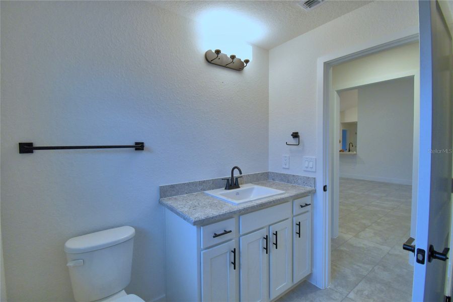 Furnished interior view inside a new home in Cadence Crossing, Auburndale (Image 15).