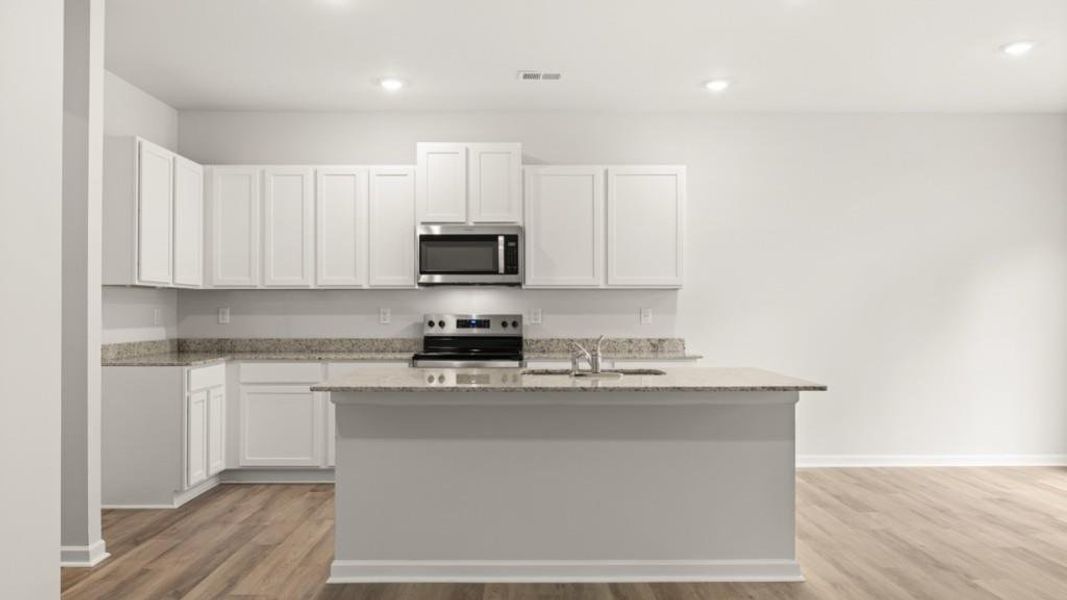 Furnished interior view inside a new home in Oconee Overlook Townhomes, Gainesville (Image 3).