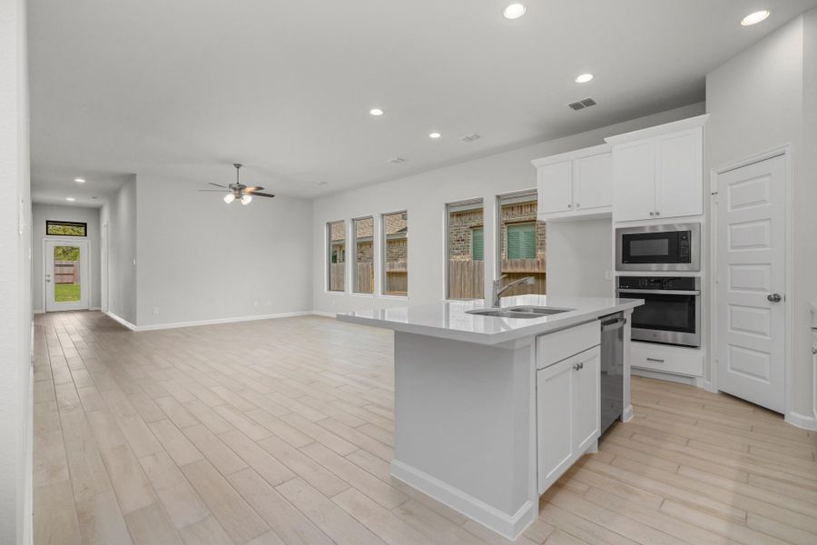 Open kitchen and living layout designed for everyday living and entertaining.