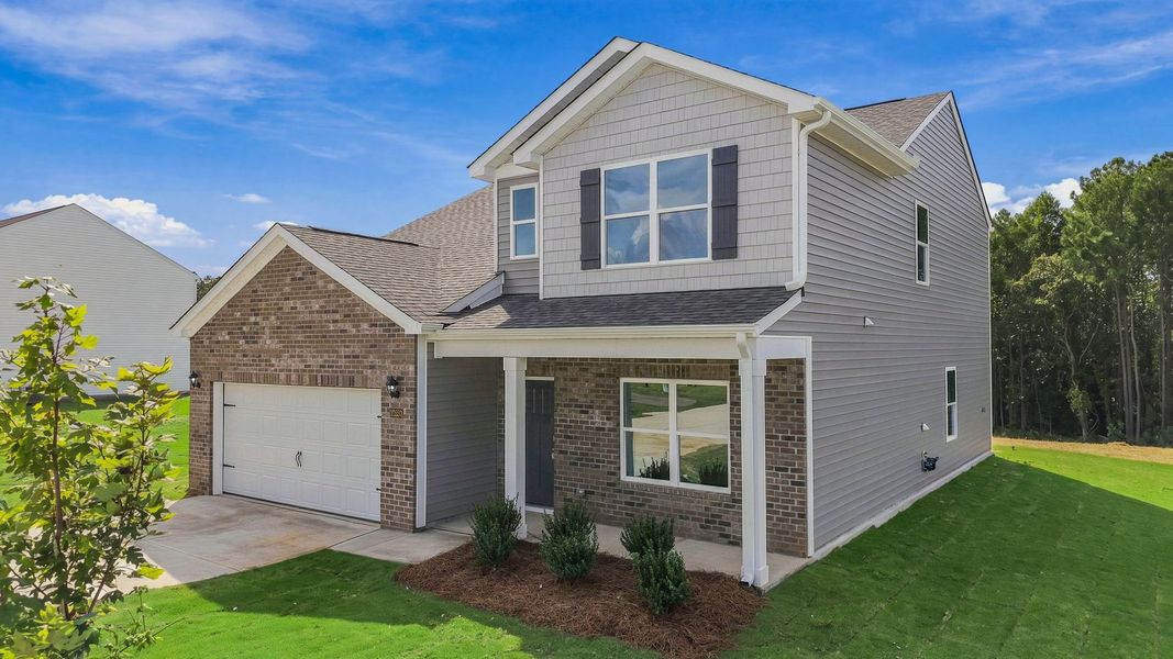 Front exterior of a new home in Beaver Dam Crossing, Bailey, NC, highlighting curb appeal (Image 19).