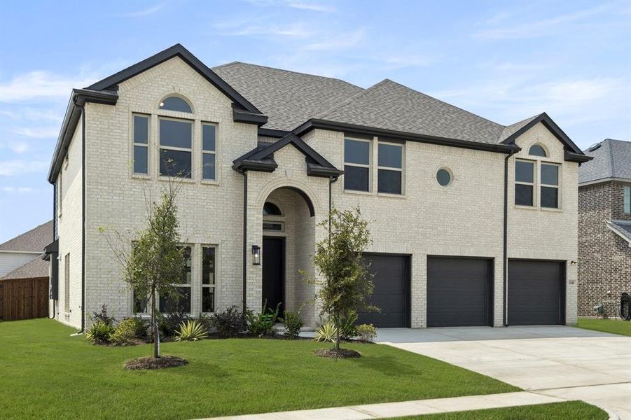 Front exterior of a new home in Grayhawk Addition, Forney, TX, highlighting curb appeal (Image 24). Front exterior of a new home in Grayhawk Addition, Forney, TX, highlighting curb appeal (Image 24).
