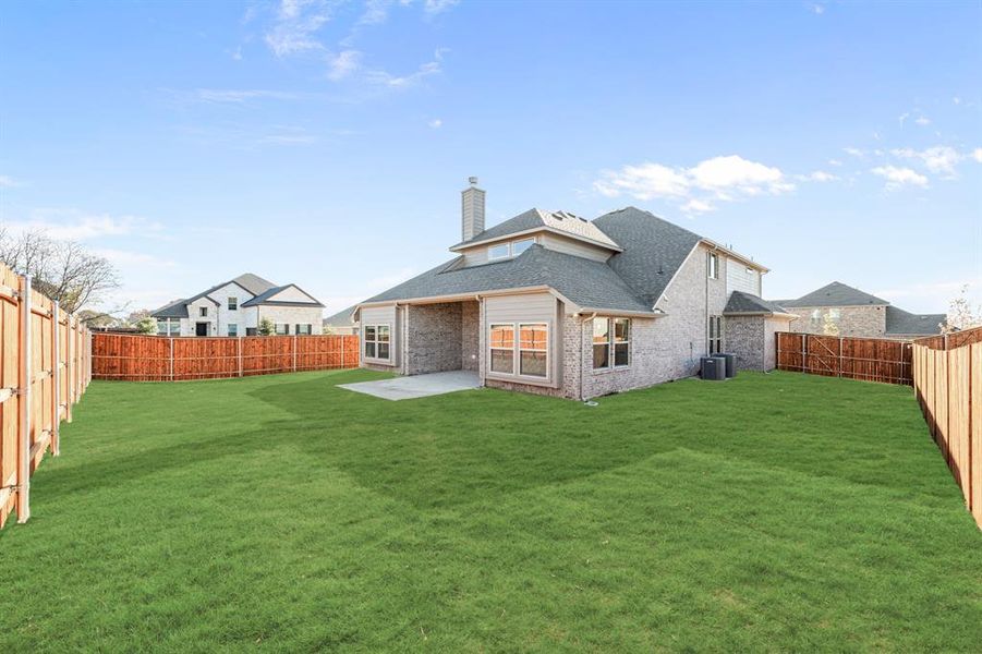 Exterior details and patio area of a home in The Grove, Midlothian (Image 22).
