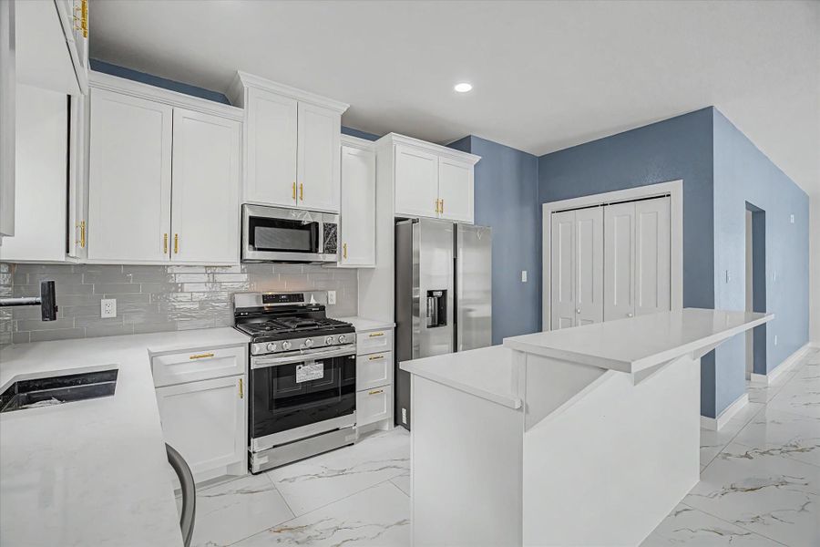 Stainless steel refrigerator, dishwasher, and gas stove are included. Stainless steel refrigerator, dishwasher, and gas stove are included.