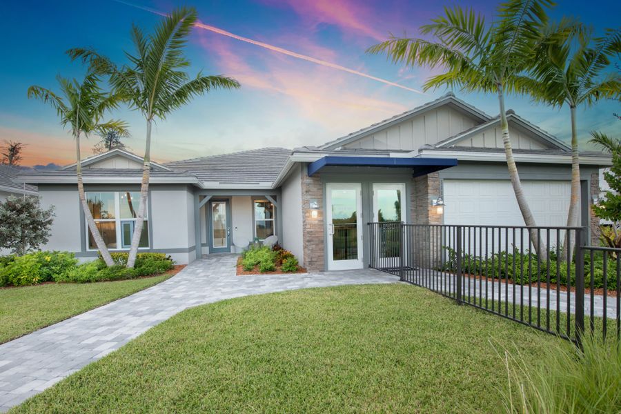 Front exterior of a new home in Costa Pointe, Vero Beach, FL, highlighting curb appeal (Image 2).