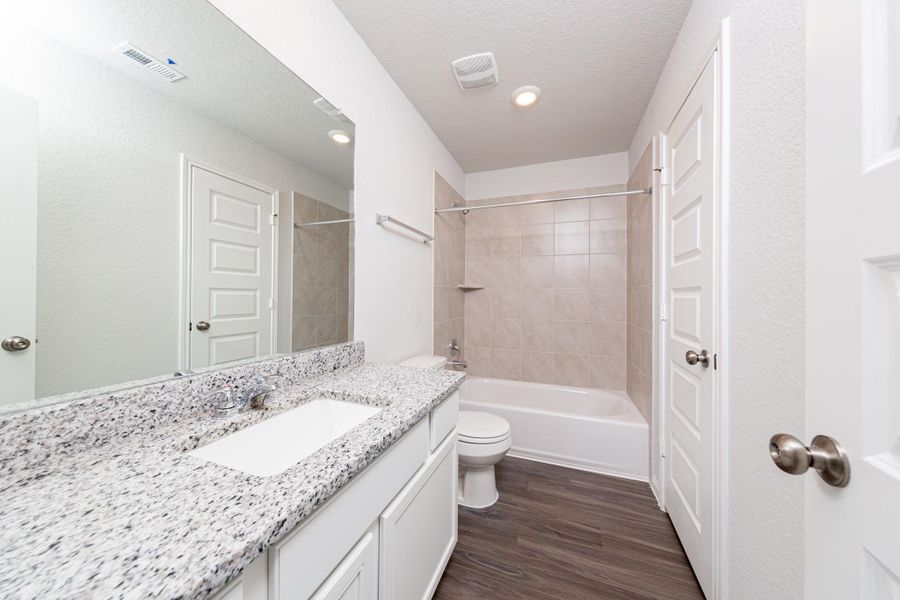 Furnished interior view inside a new home in Cliffstone Hills, Conroe (Image 11).