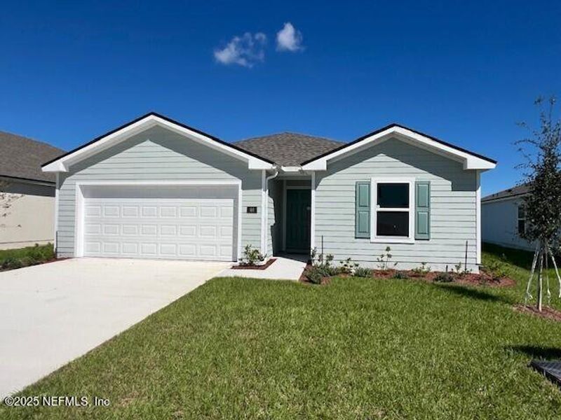 Exterior details and patio area of a home in Sawmill Branch Express, Palm Coast (Image 4).