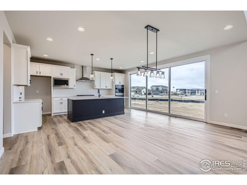 Furnished interior view inside a new home in RainDance - 60s, Windsor (Image 12).