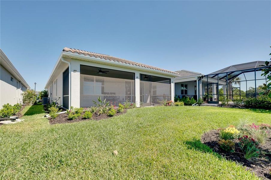 Exterior details and patio area of a home in BeachWalk by Manasota Key, Englewood (Image 36).