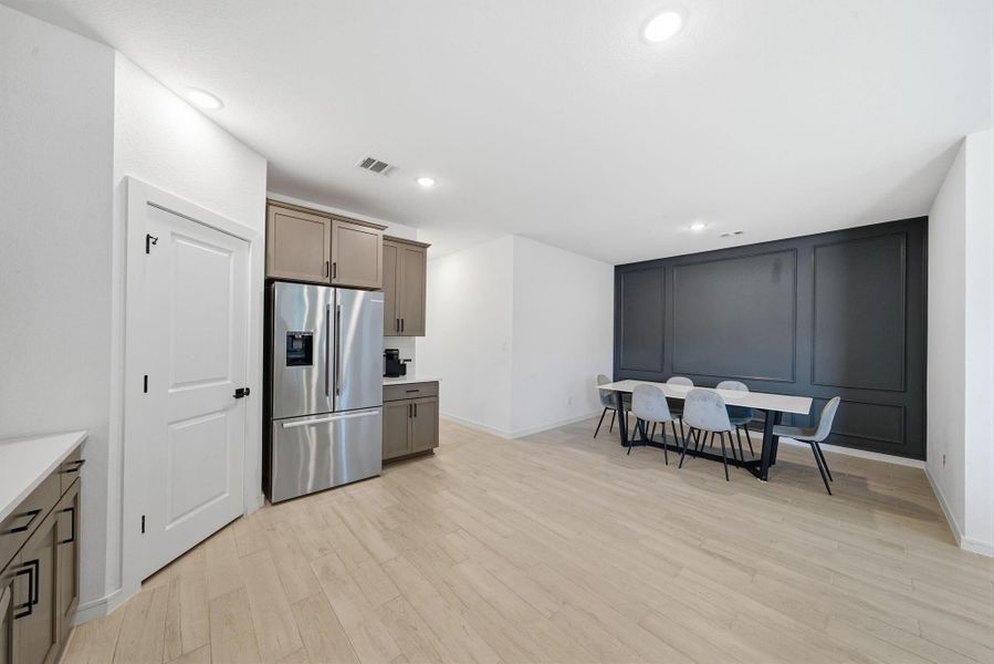 Modern kitchen and dining area.