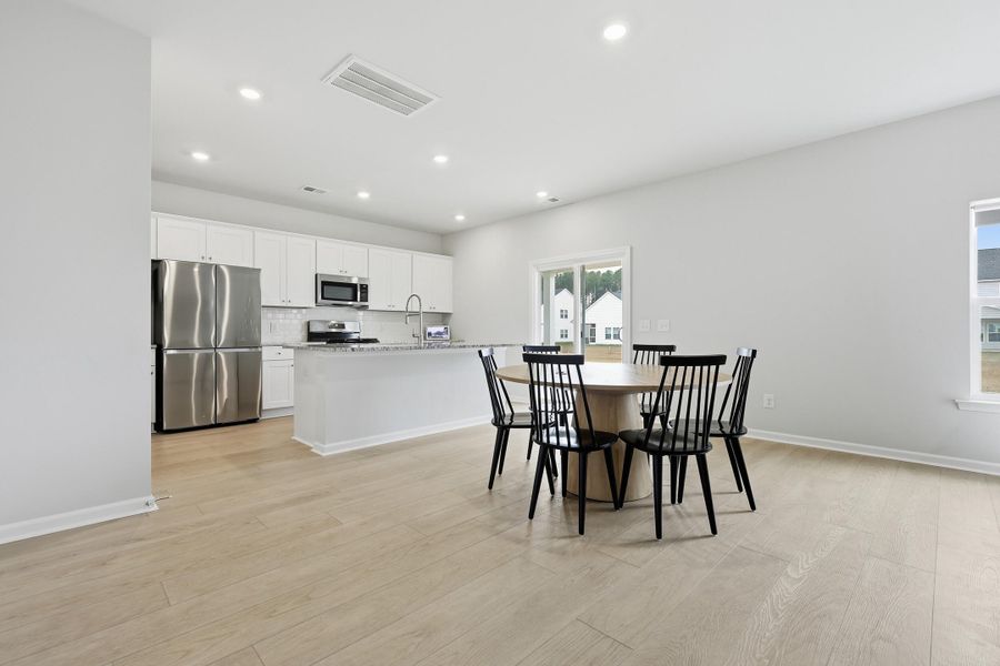Furnished interior view inside a new home in Sweetgrass at Summers Corner: Carolina Collection, Summerville (Image 13).