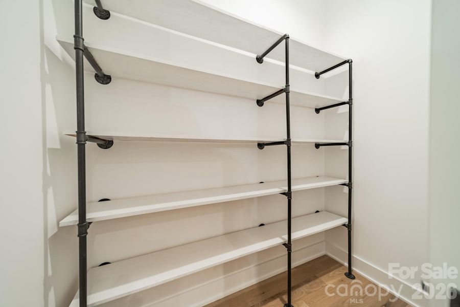 Enjoy an oversized Walk-in Pantry
