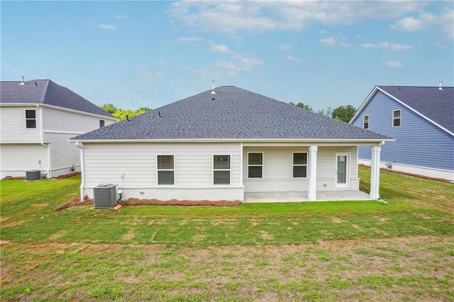Exterior details and patio area of a home in Conner Springs, Social Circle (Image 2).