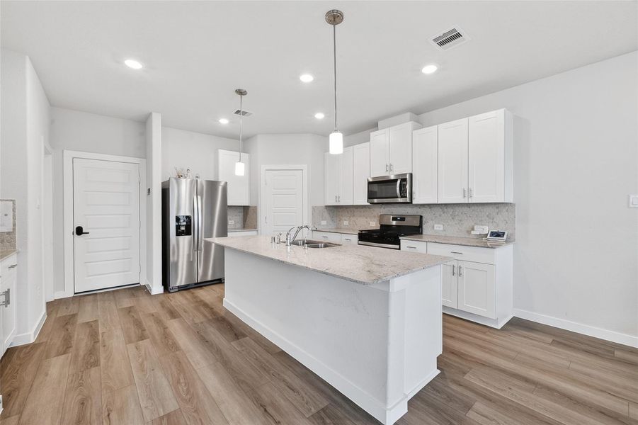 Furnished interior view inside a new home in McClendon Park Village, Houston (Image 19).