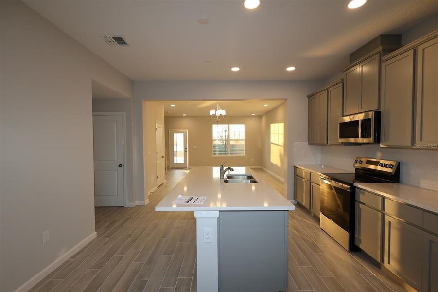 Furnished interior view inside a new home in Tribute at Ovation, Winter Garden (Image 14). Furnished interior view inside a new home in Tribute at Ovation, Winter Garden (Image 14).